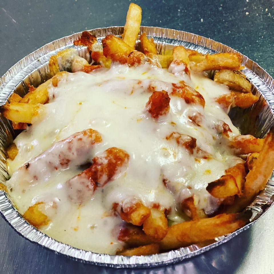Order Pizza Fries - Appetizer food online from Mystic Restaurant store, North Wales on bringmethat.com