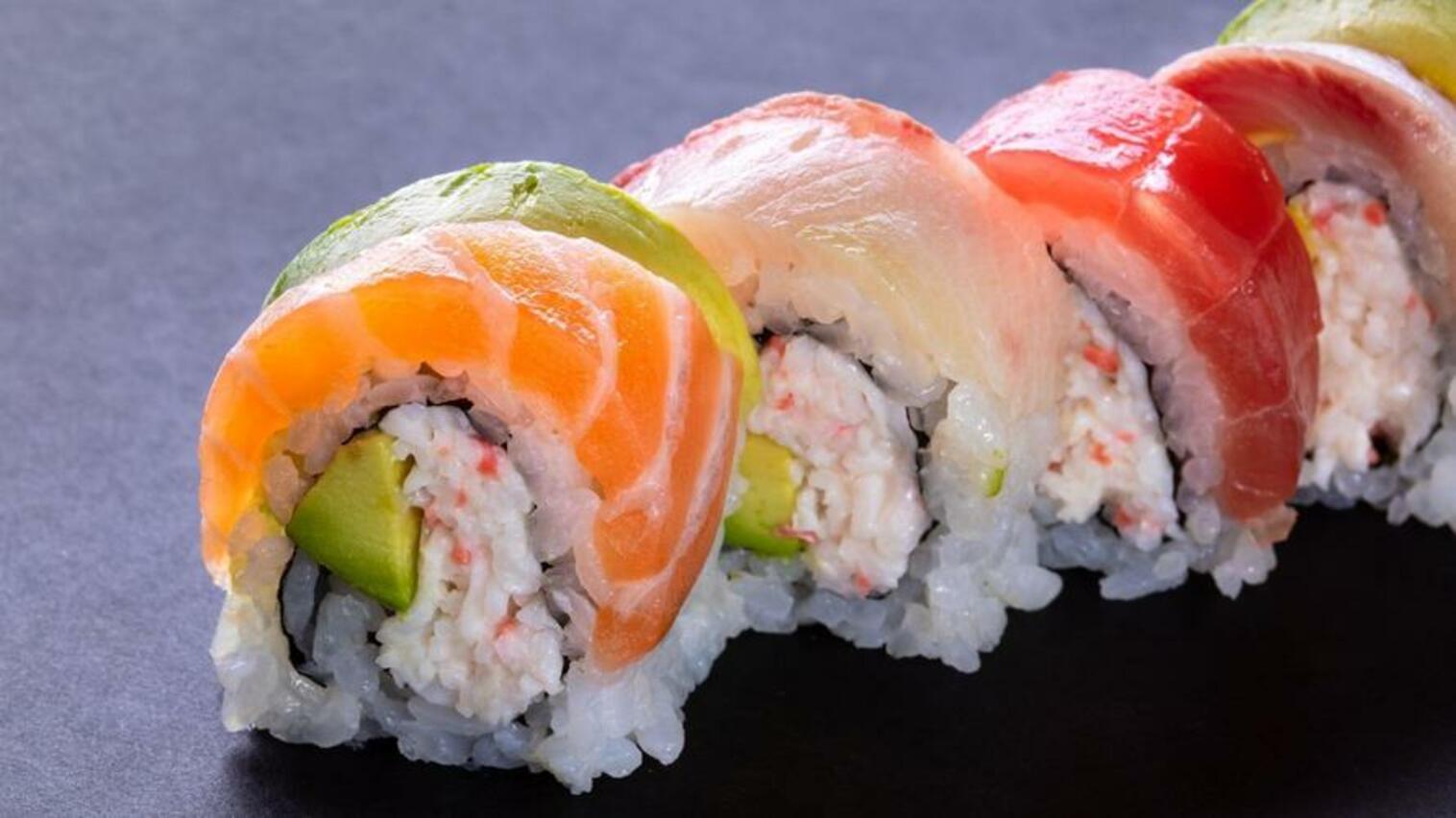 Order (a005) Rainbow Roll food online from Sushi Stop store, Los Angeles on bringmethat.com