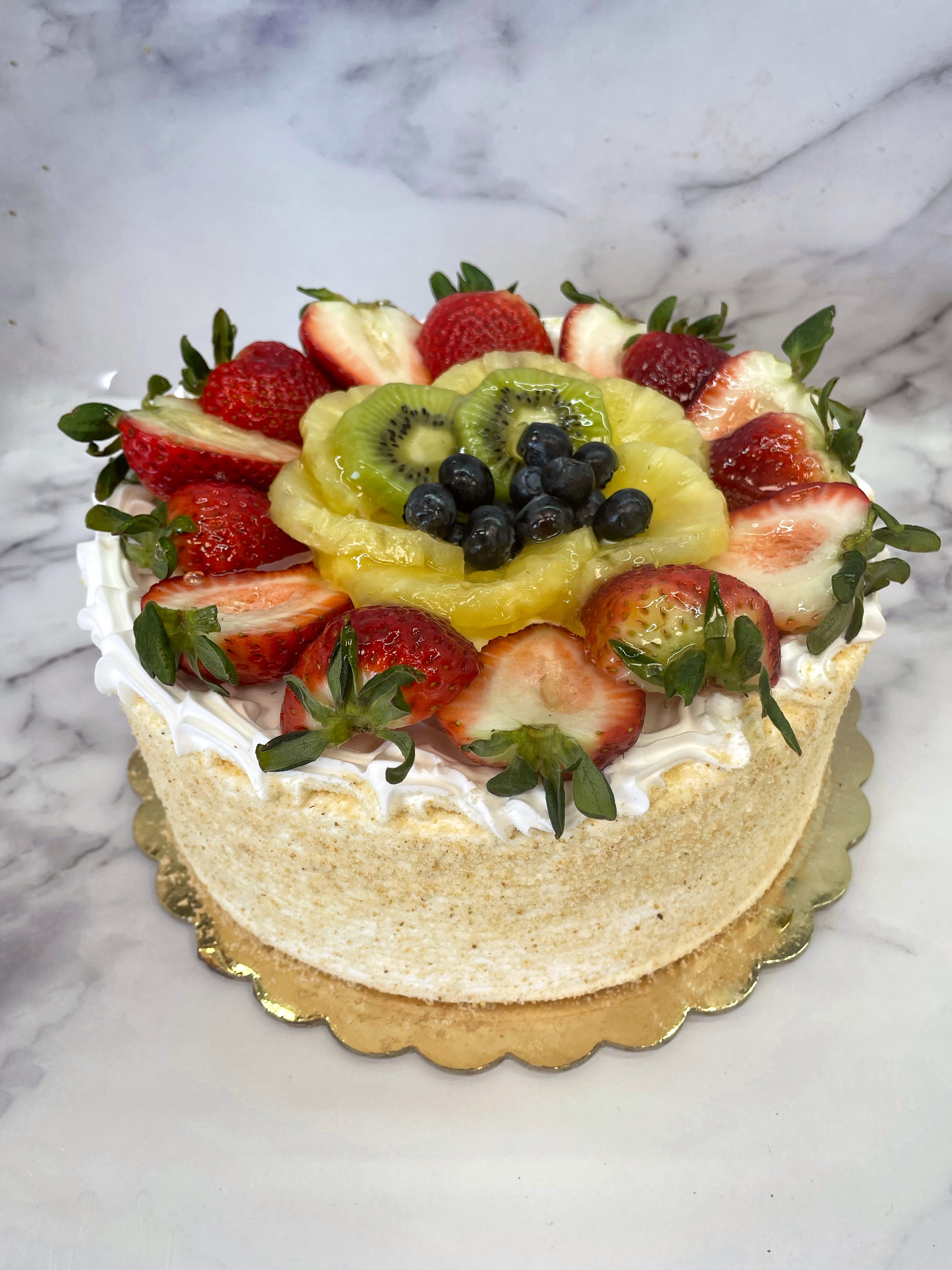 Order Vanilla Fruit Cake food online from Sarkis Pastry store, Pasadena on bringmethat.com
