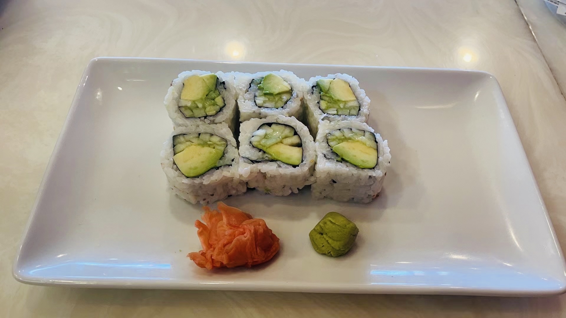 Order Avocado & Cucumber Roll food online from Extreme Teriyaki Grill Express store, Waldorf on bringmethat.com