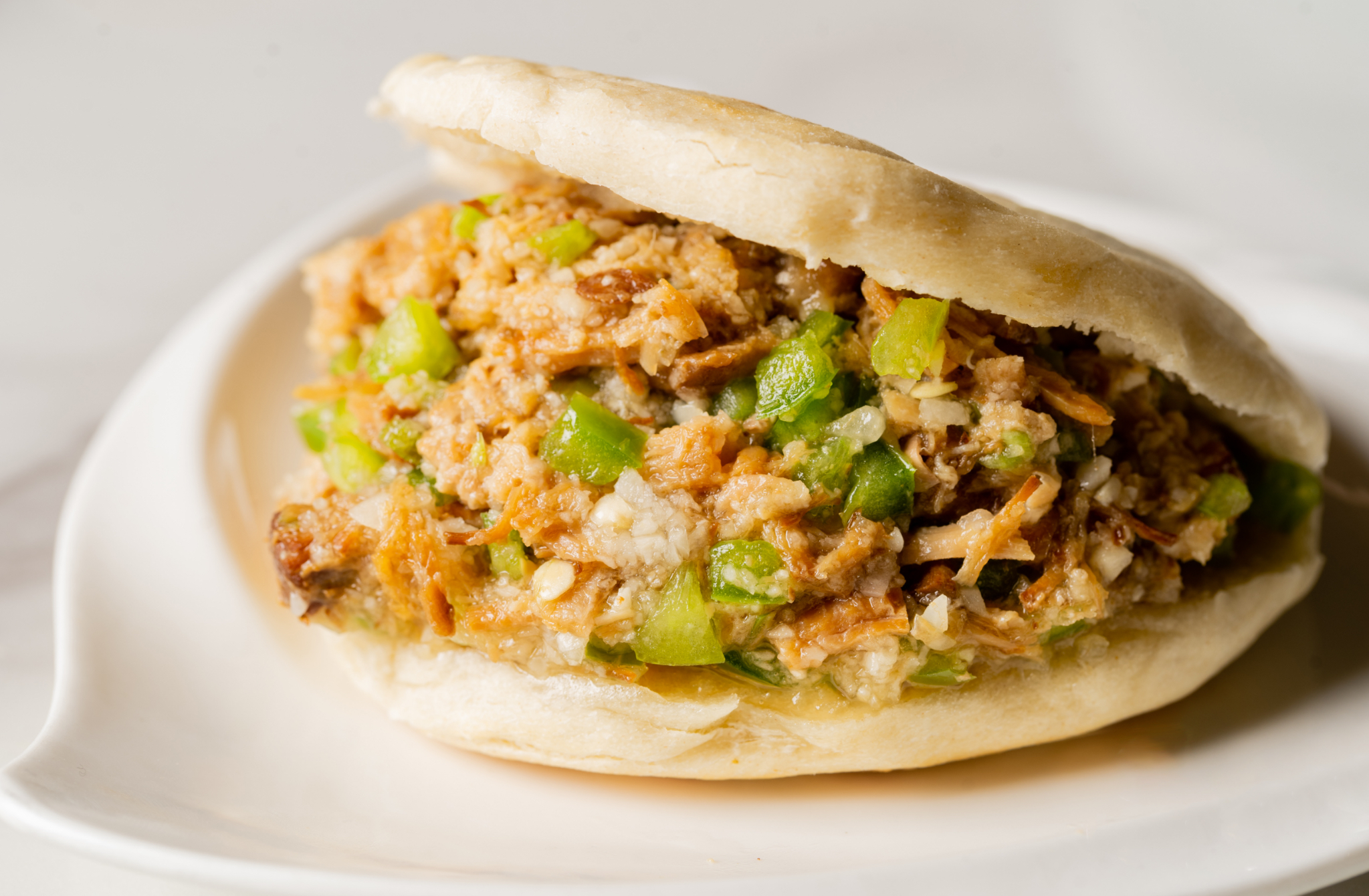 Order S2. Pork Pita Burger with Garlic and Green Pepper food online from Dun Huang store, Irvine on bringmethat.com