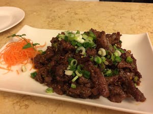 Order S2. 葱香孜然牛 Cumin Beef with Scallion food online from Sichuan Hot Pot 九寨溝火锅川菜 store, Cleveland on bringmethat.com