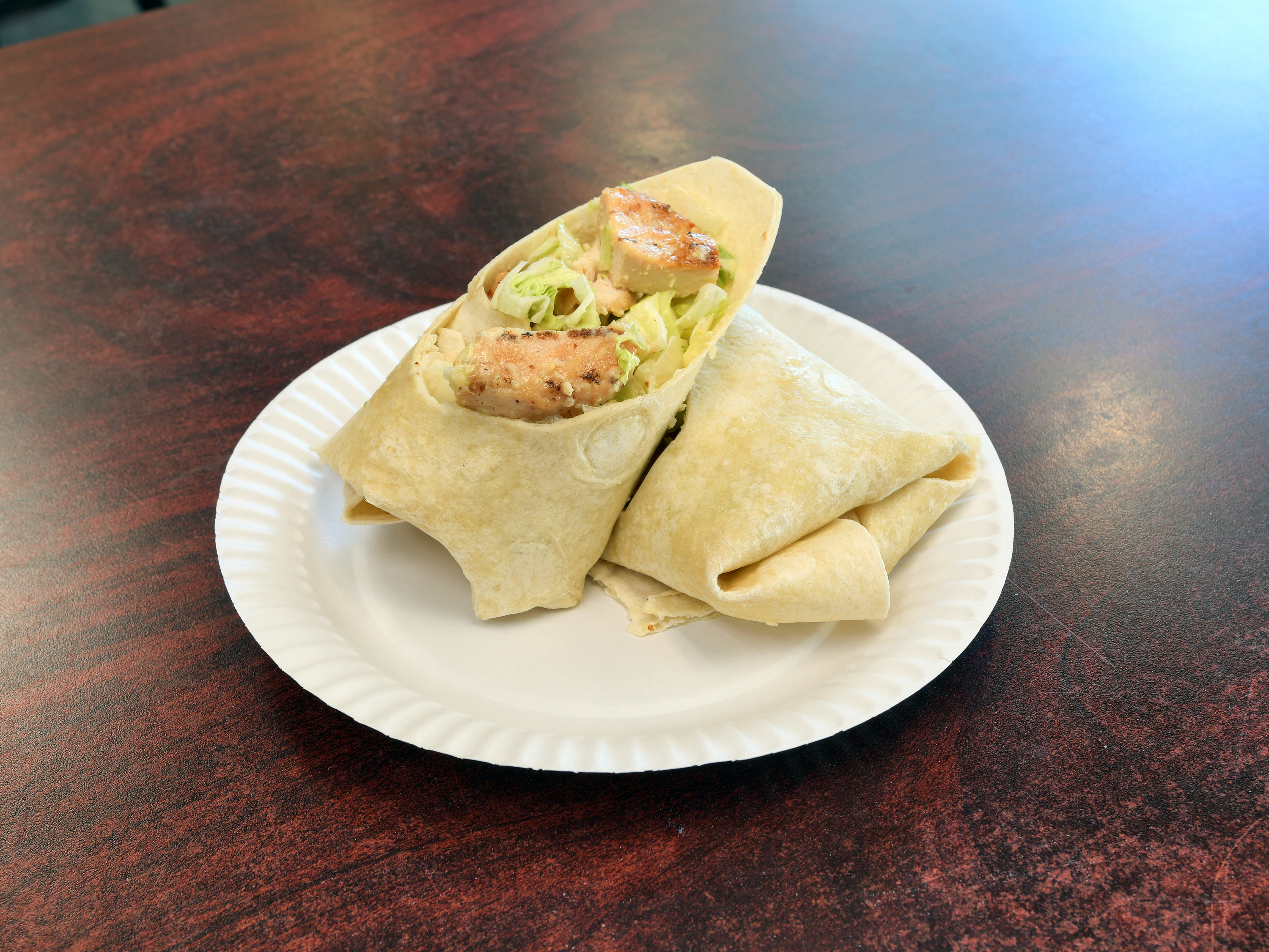 Order Chicken Caesar Wrap food online from Homestead Grocery & Deli store, Amherst on bringmethat.com