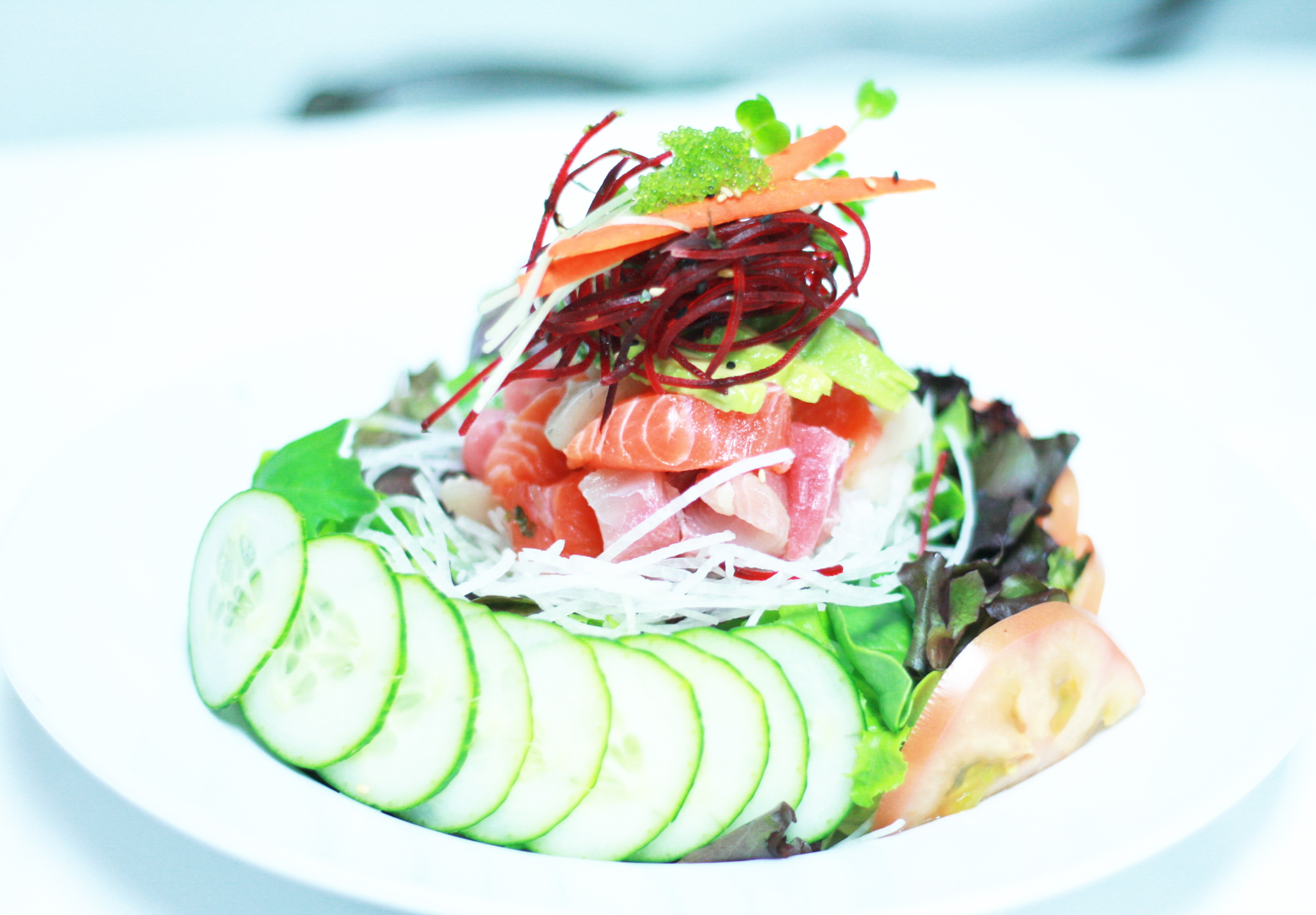 Order S10. Sashimi Salad food online from Koisan Sushi & Japanese Cuisine store, Orange on bringmethat.com