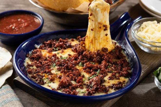 Order Melted Queso Fundido food online from On The Border store, Mt. Laurel on bringmethat.com