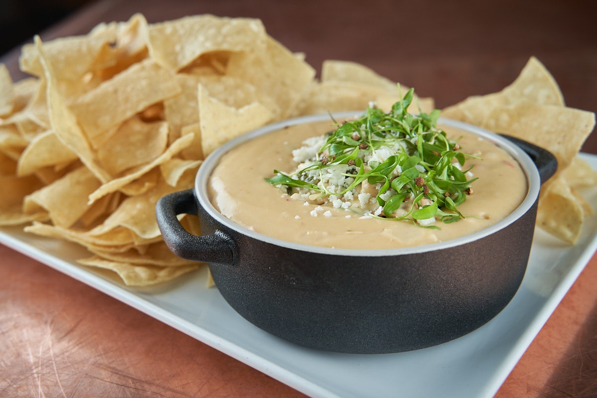 Order QUESO DIP food online from Secret Sauce store, Gaithersburg on bringmethat.com
