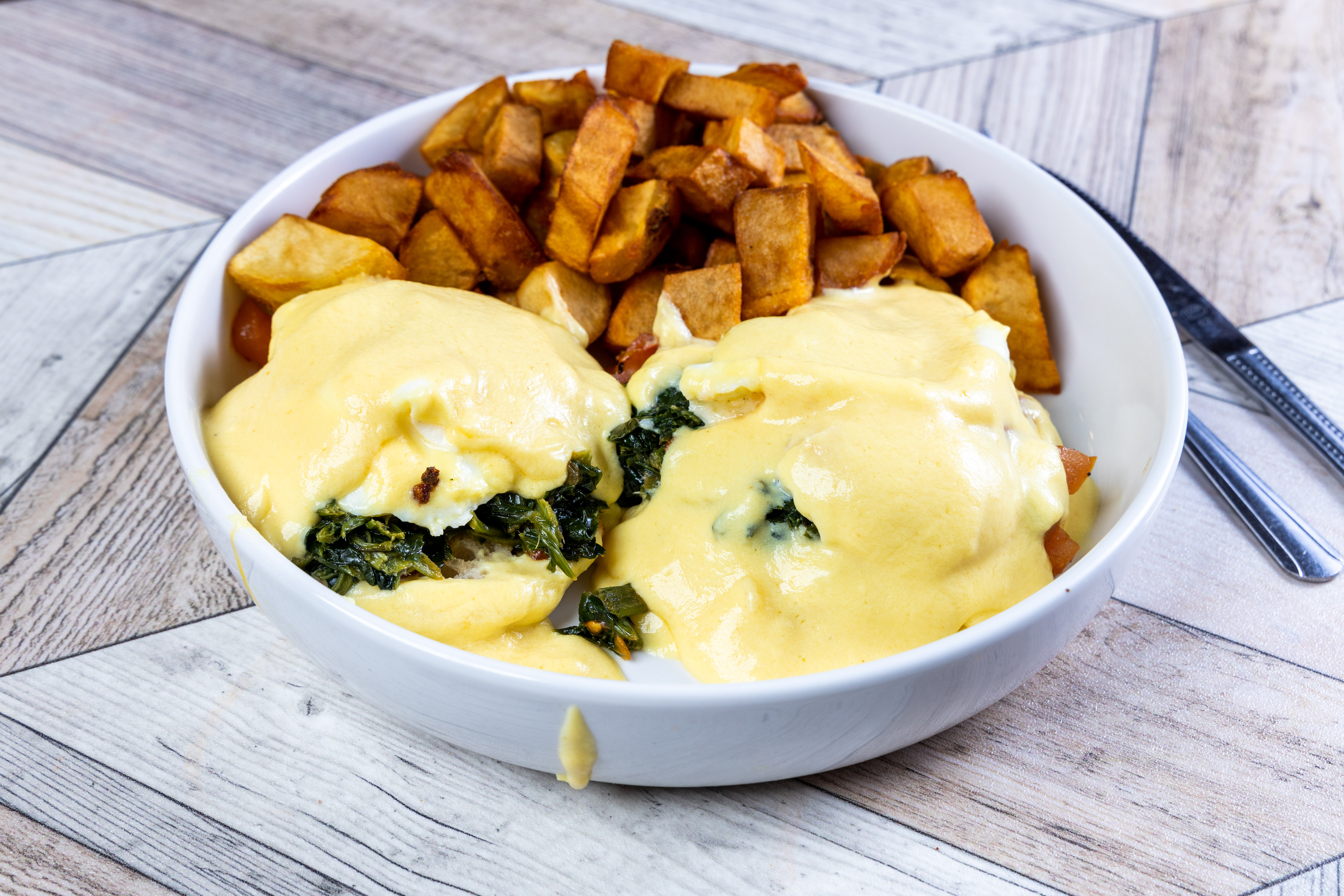 Order Eggs Florentine food online from Top View Restaurant store, Chicago on bringmethat.com
