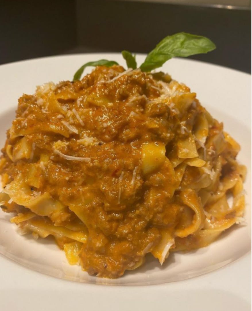 Order Fettuccine Bolognese - Pasta food online from Gino's Of Tuscany store, Bethpage on bringmethat.com