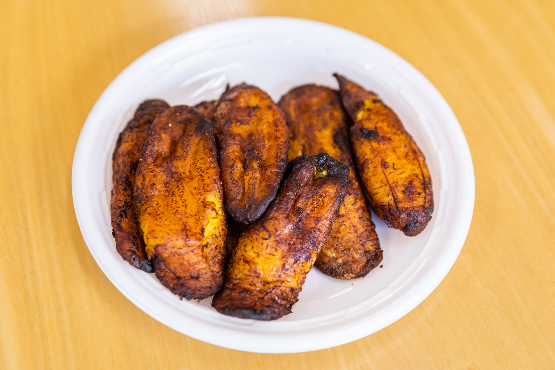 Order 8 Fried Plantains food online from Blue Tortilla store, Selden on bringmethat.com
