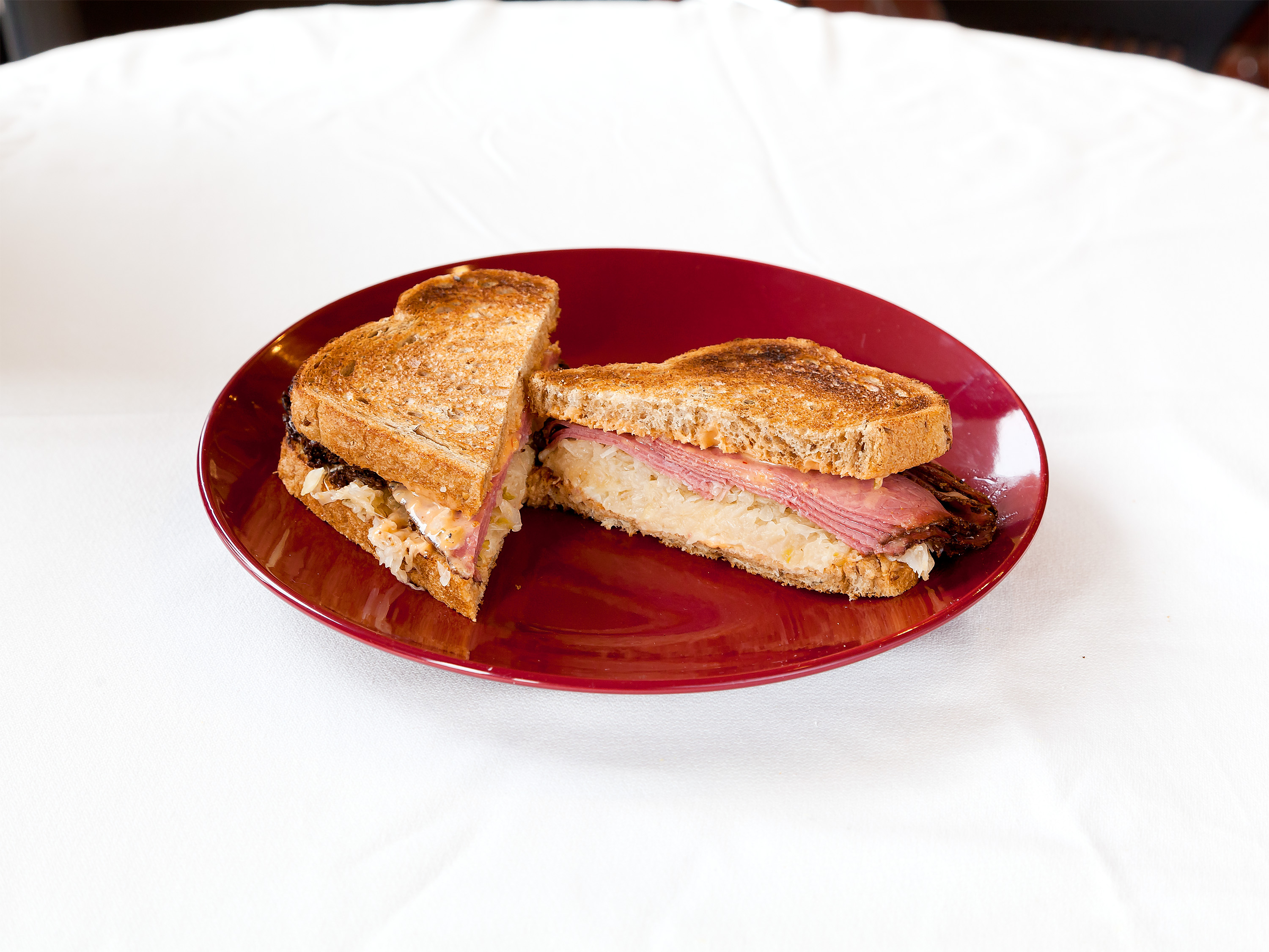Order Corned Beef Reuben Sandwich food online from Rossi Cafe & Deli store, Concord on bringmethat.com