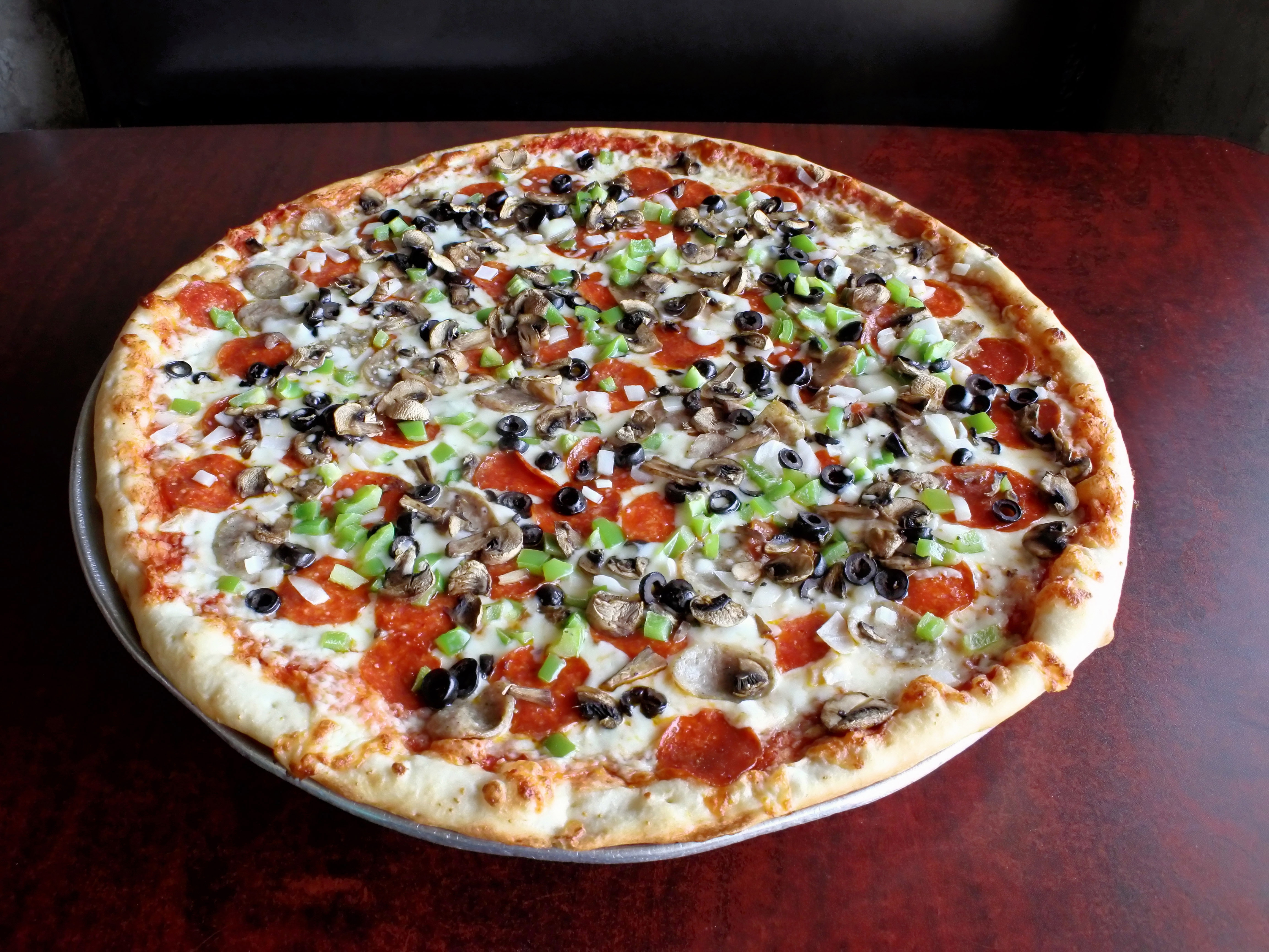 Order 14" Supreme Pizza food online from Falcone Pizzeria store, Oklahoma City on bringmethat.com
