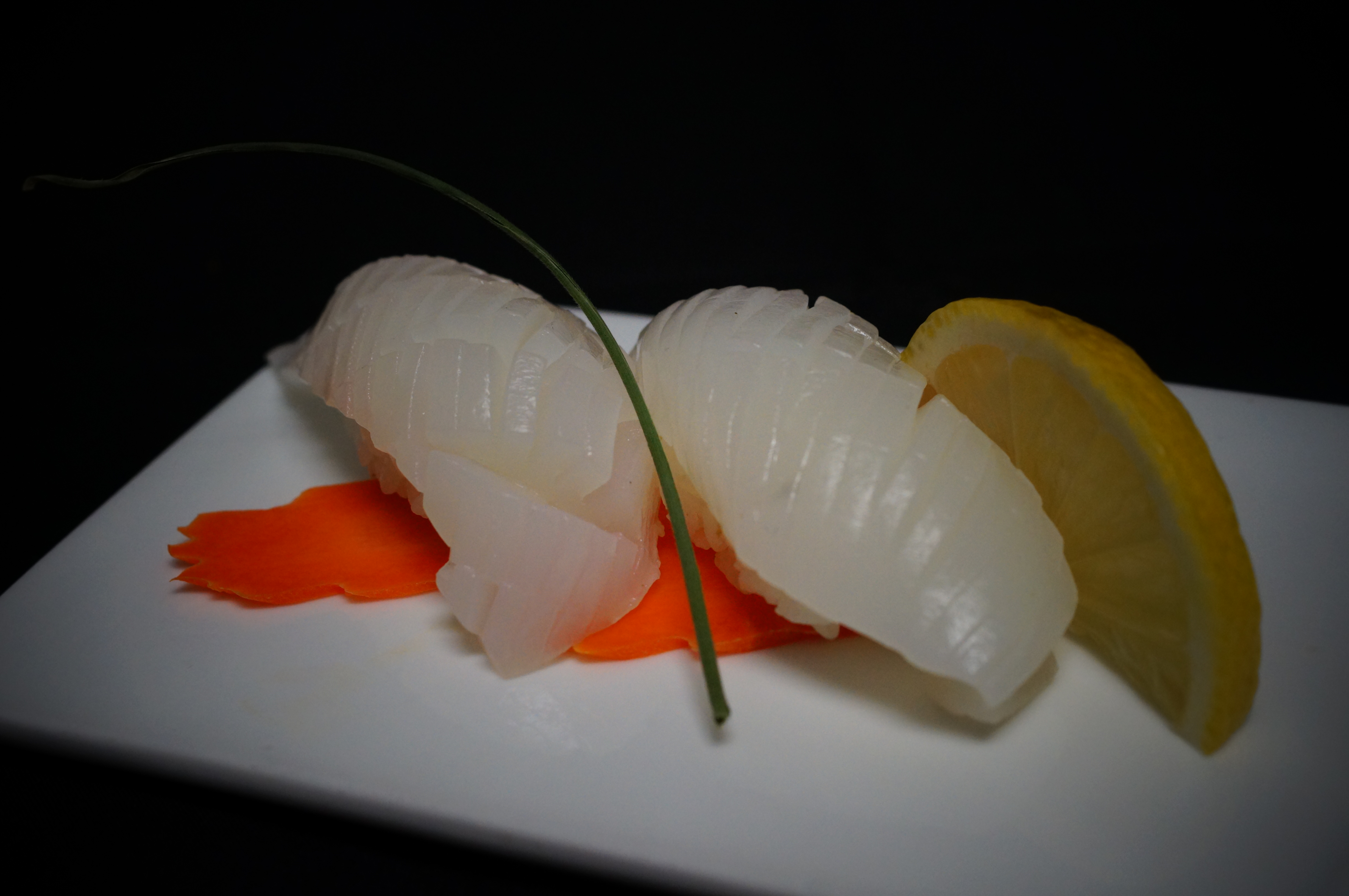 Order Squid Sushi food online from Sakura Sushi And Grill store, Albuquerque on bringmethat.com