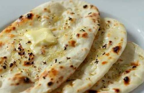 Order Butter Tandoori Roti food online from Deccan Spice store, Jersey City on bringmethat.com