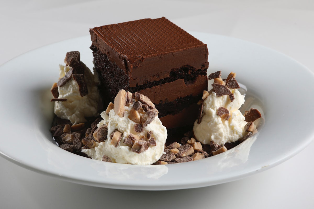 Order DECADENT CHOCOLATE CAKE food online from Romano's Macaroni Grill store, Cerritos on bringmethat.com
