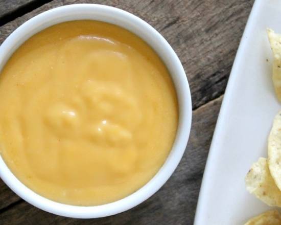 Order Spicy Cheese Sauce food online from Amigos/Kings Classic store, Omaha on bringmethat.com