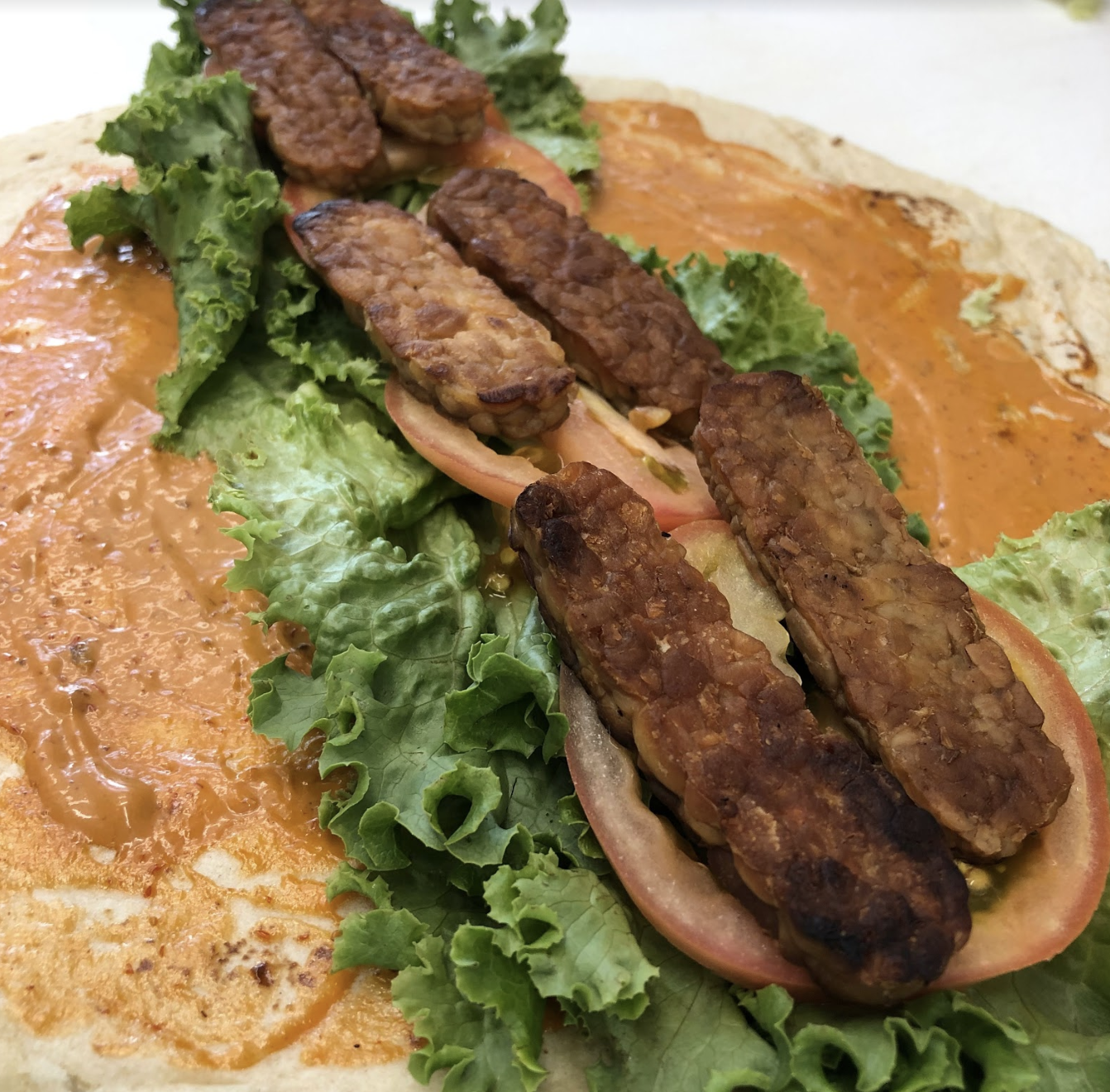 Order Spicy Tempeh Wrap food online from Mata G Vegetarian Kitchen store, Albuquerque on bringmethat.com