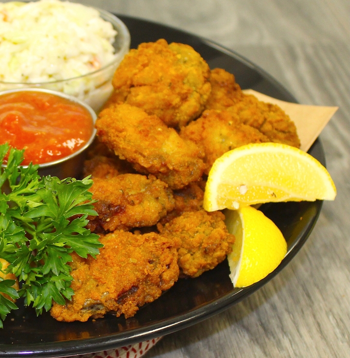 Order Breaded Oysters Chesapeake 12ct food online from Captain’s Curbside Seafood store, Trappe on bringmethat.com