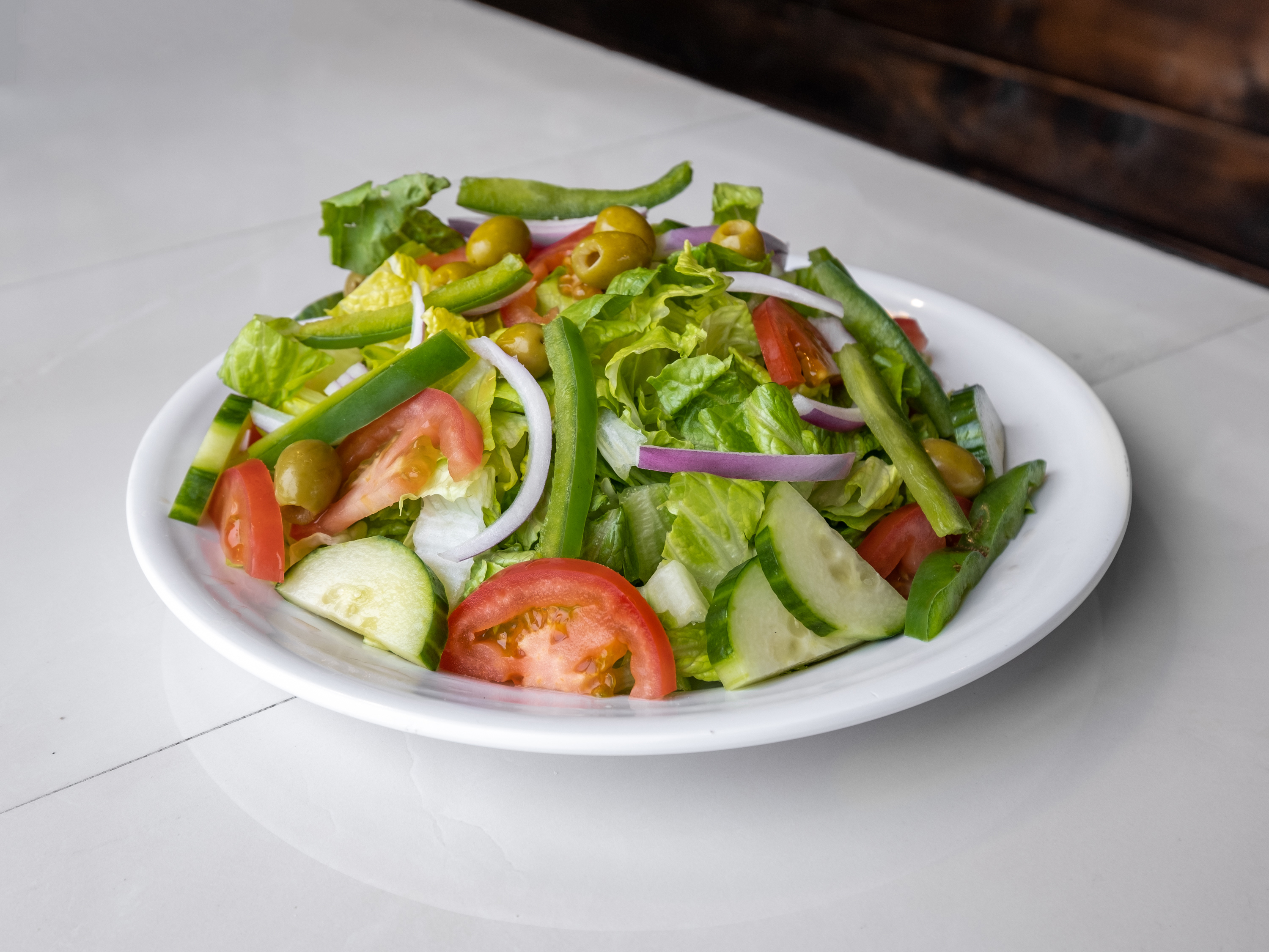 Order Garden salad food online from New Yorker Pizza store, Leesburg on bringmethat.com