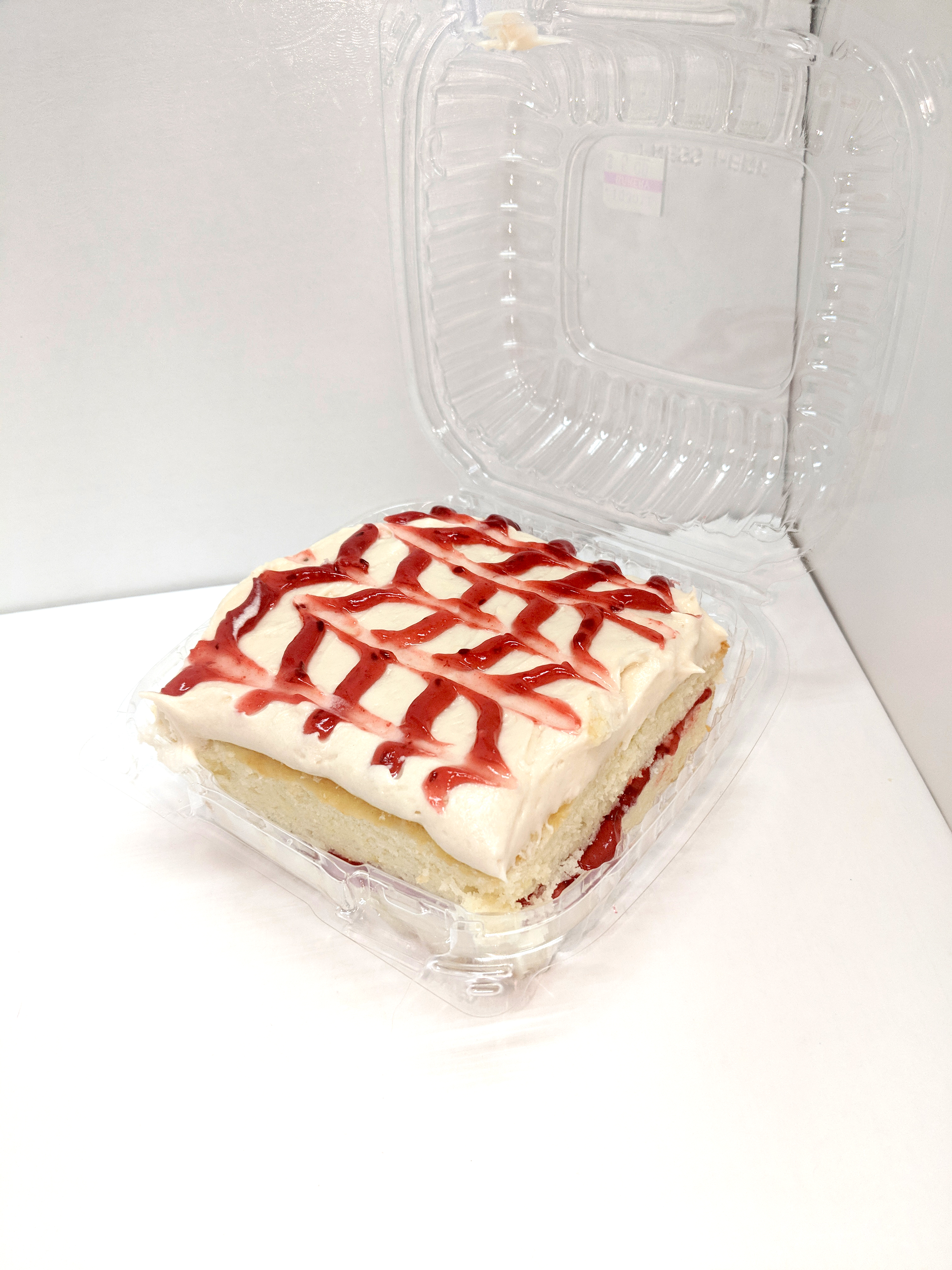 Order Raspberry Cream Cheese Cake food online from Rockabilly Bakery And Cafe store, Huntsville on bringmethat.com