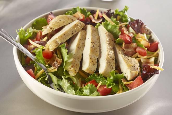 Order Grilled Chicken Club Salad food online from Johnny Rockets store, Anaheim on bringmethat.com