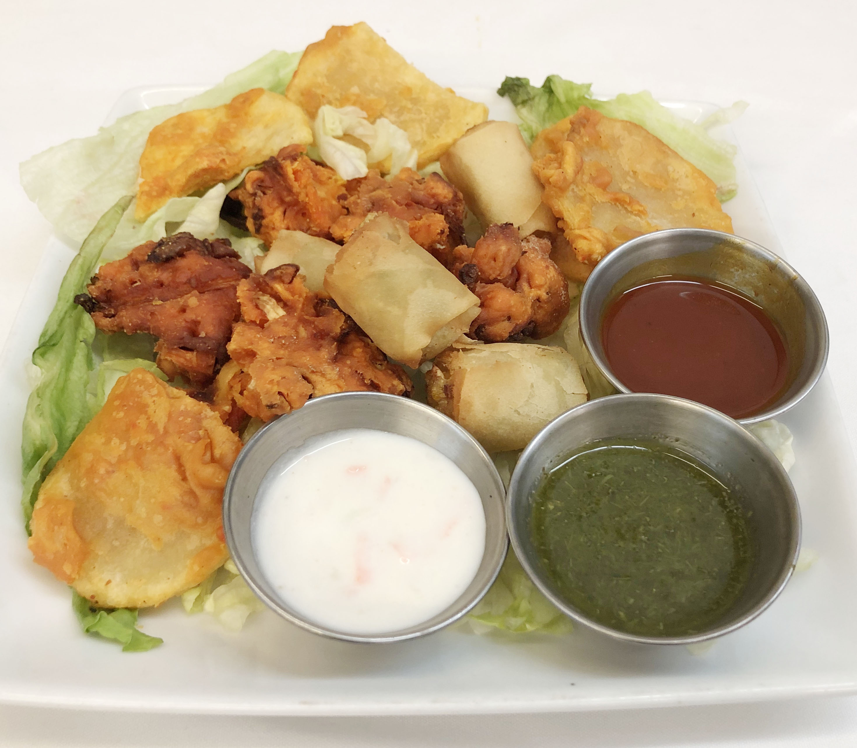 Order 3. Assorted Vegetable Fritters food online from Himalayan Grill store, Flagstaff on bringmethat.com