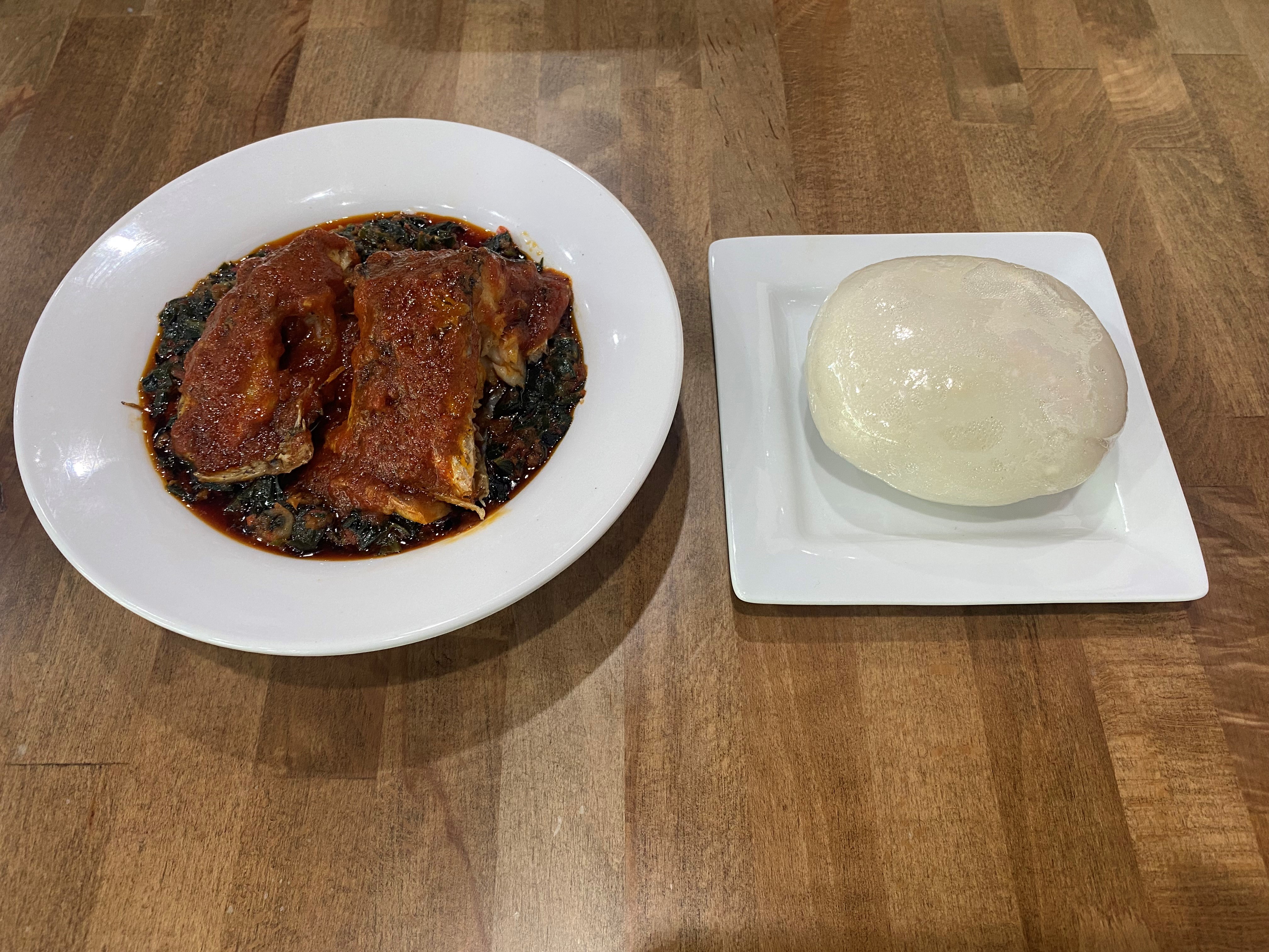 Order Poundo-Fufu + Efo Riro-Spinach + Fish food online from Fusion Vibes Kitchen + Bar store, Richardson on bringmethat.com