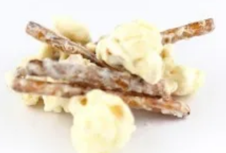 Order White Chocolate Surprise Popcorn food online from What's Poppin Texas store, Bedford on bringmethat.com