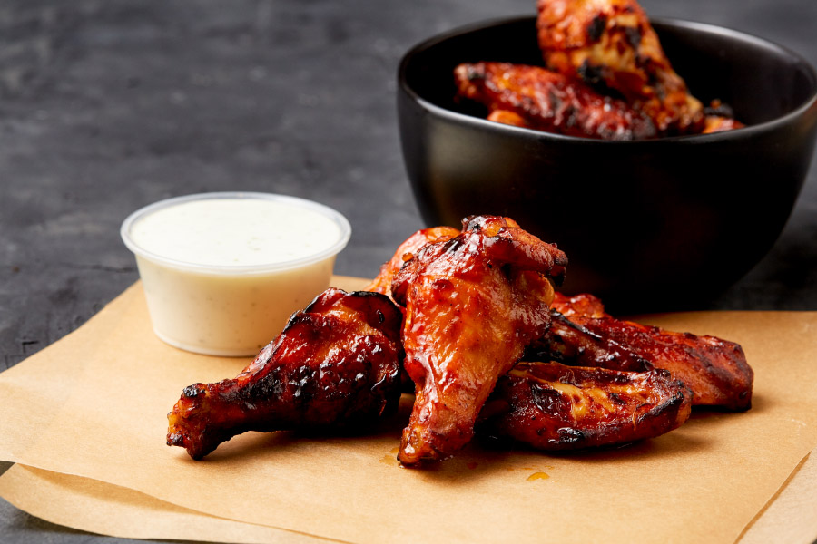 Order Traditional Wings food online from Simple Simon's Pizza store, Dewey on bringmethat.com