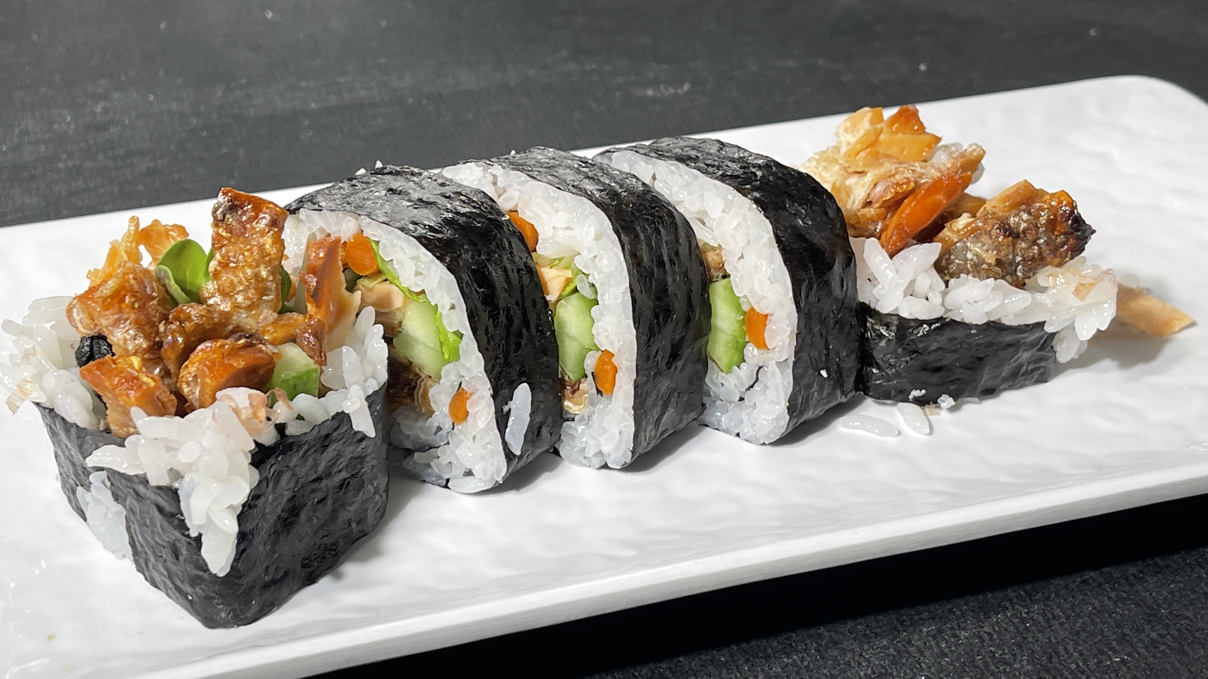 Order 50. Salmon Skin Cut Roll food online from Miyoda Sushi store, Redondo Beach on bringmethat.com