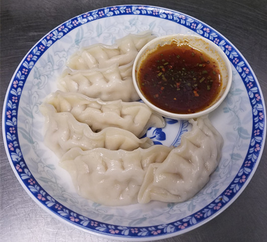 Order 14. Meat Dumplings food online from Szechuan House store, Ames on bringmethat.com