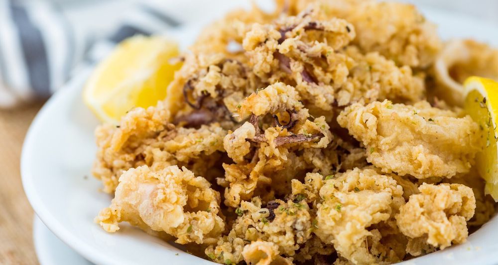 Order Calamari Fritti food online from Haystack Pizza Restaurant-Pick-Up & Delivery store, San Francisco on bringmethat.com