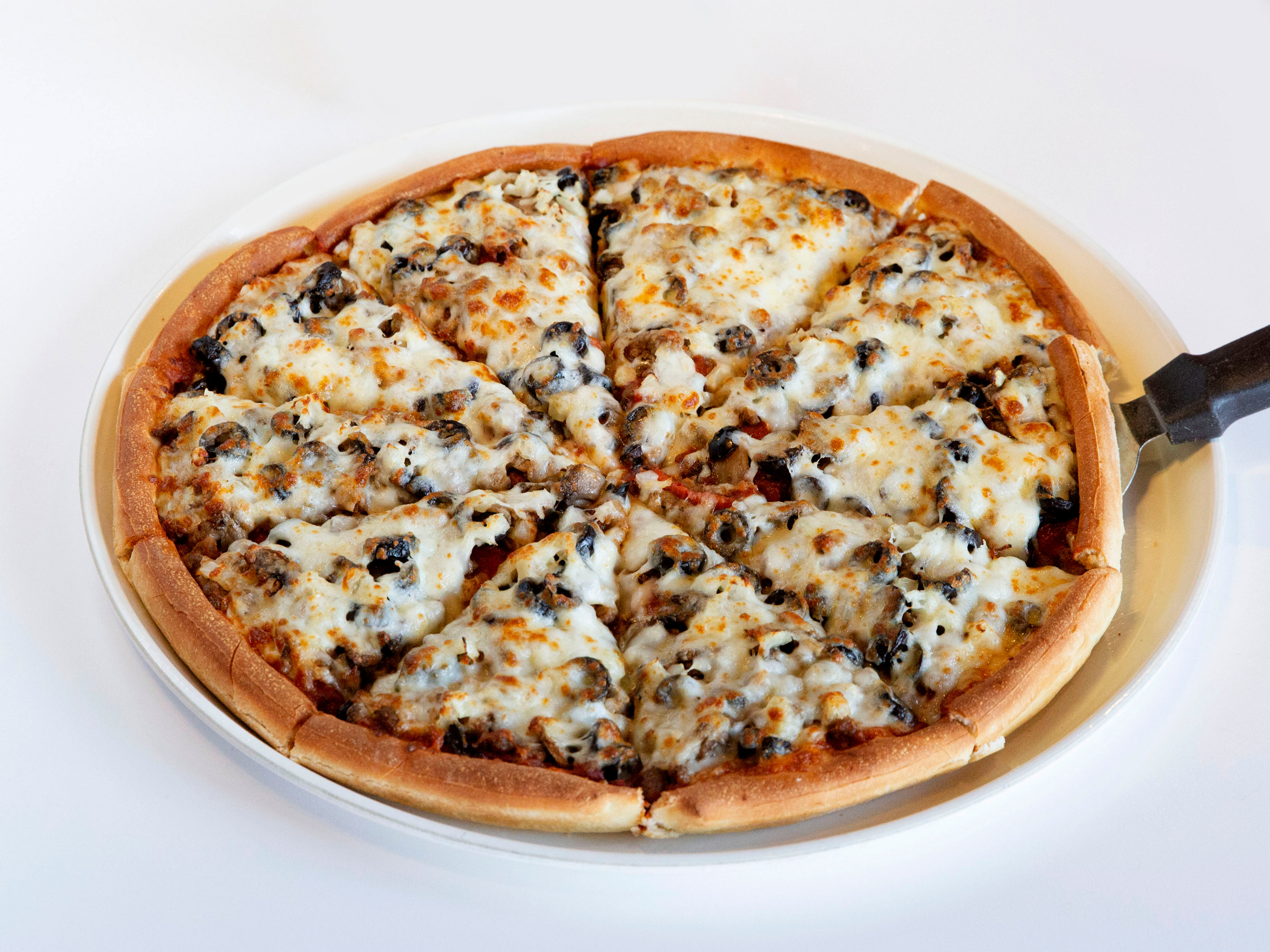 Order Classic Combo Specialty Pie food online from Godfathers Pizza store, Decatur on bringmethat.com