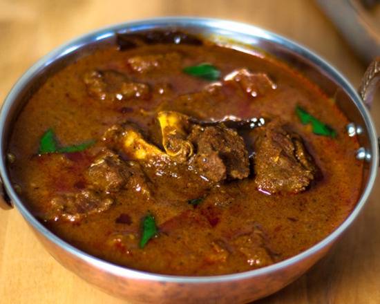 Order Goat Masala Curry food online from Namaste Indian Cuisine store, Portland on bringmethat.com