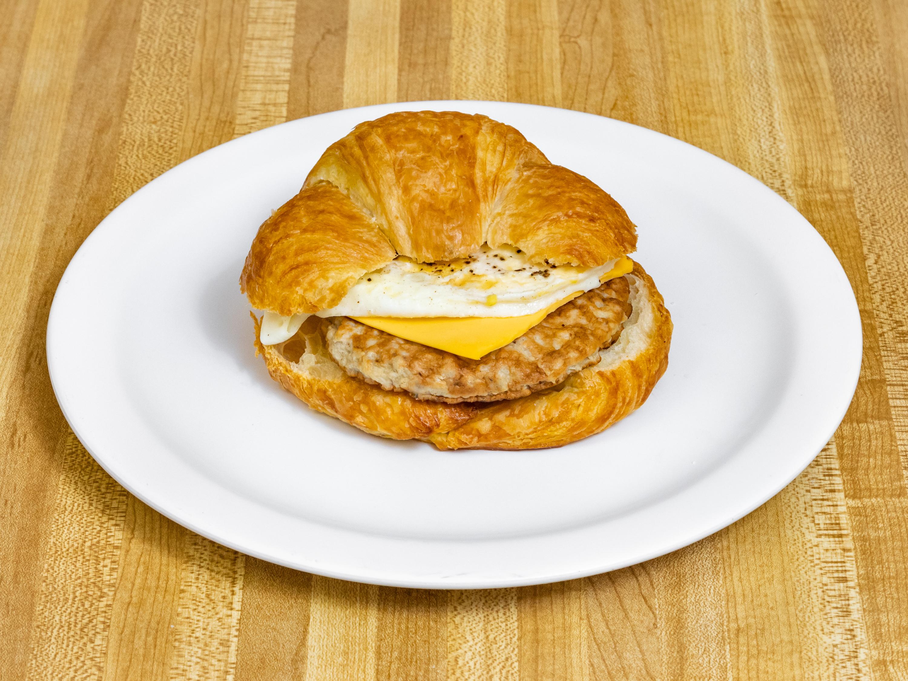 Order Sausage, Egg and Cheese Croissant food online from Donut Palace store, Garland on bringmethat.com