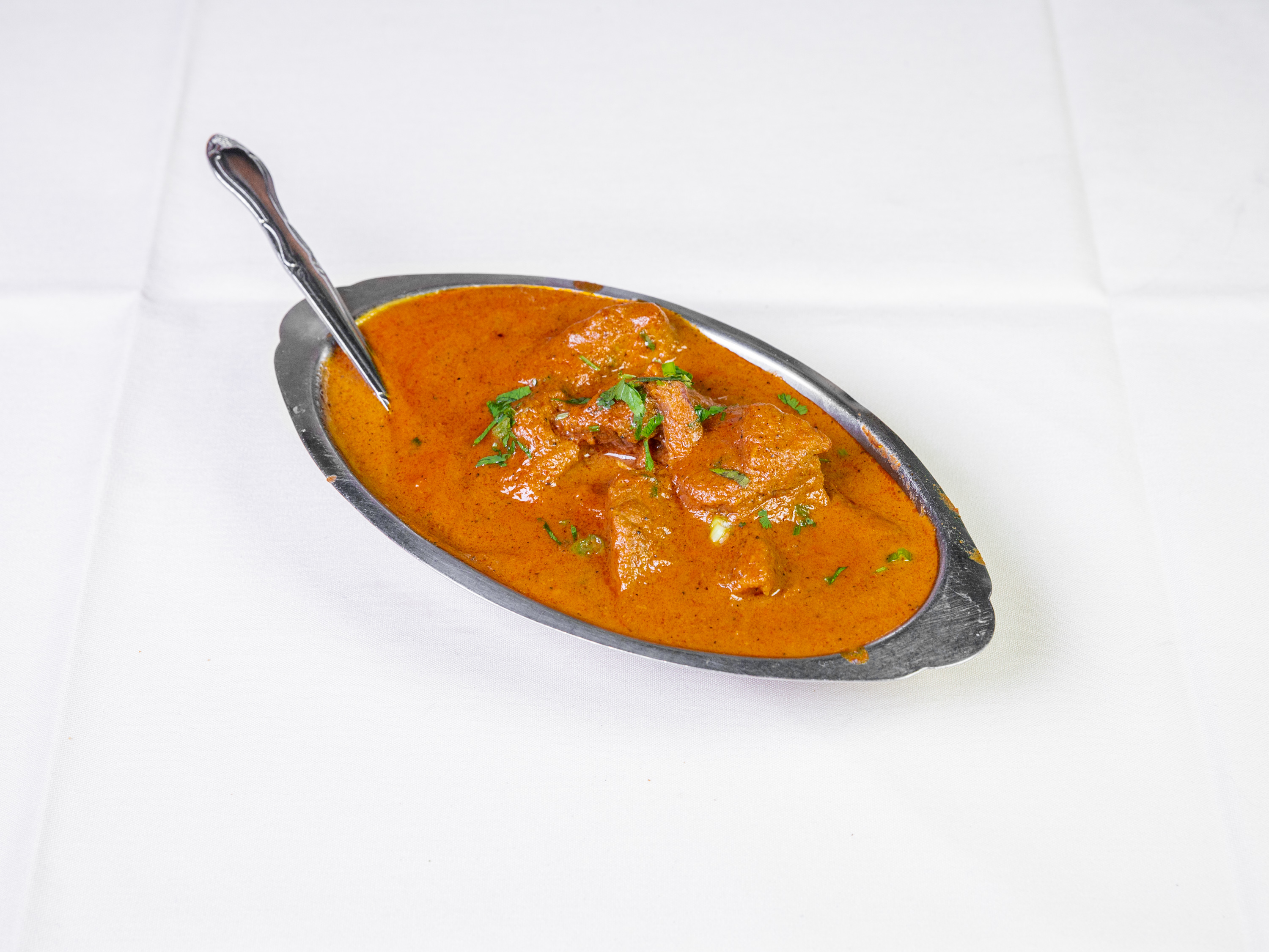 Order Lamb Curry food online from Ambar India Restaurant store, Cincinnati on bringmethat.com