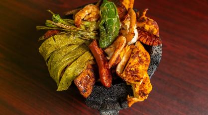 Order Molcajete Platter food online from Pancho Villa Mexican Grill store, North Plainfield on bringmethat.com
