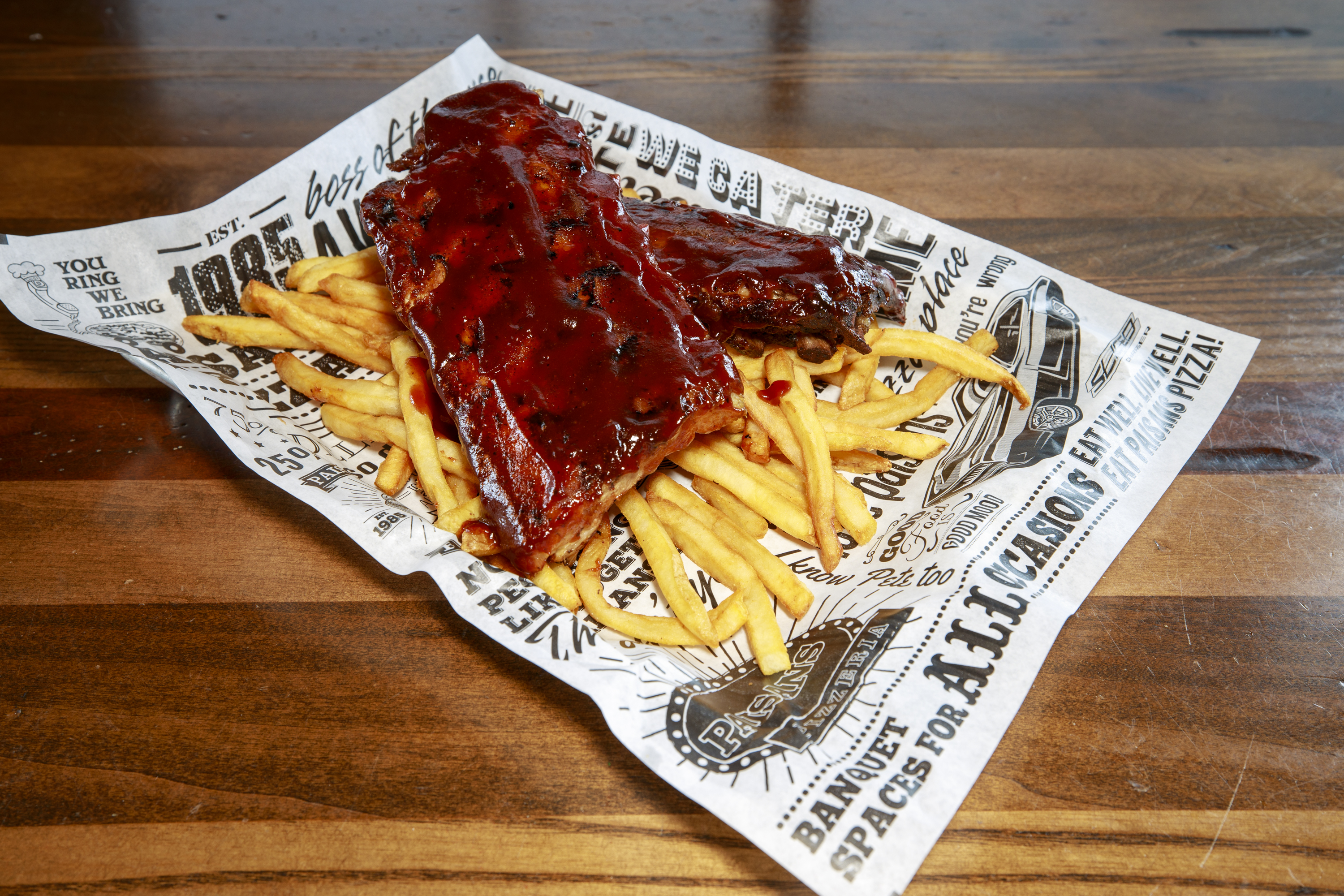 Order Award-Winning Baby Back Ribs food online from Paisans Pizza store, Lisle on bringmethat.com