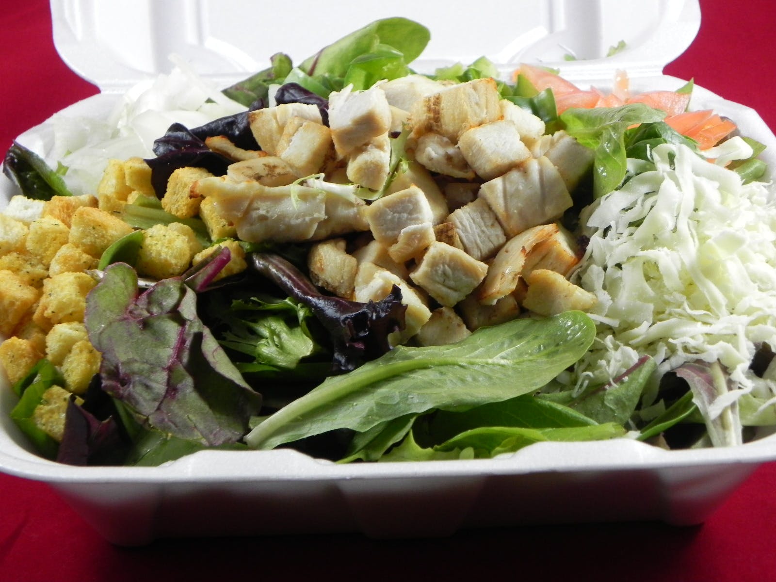 Order Grilled Chicken Salad - Salad food online from Tomatoes store, Carnegie on bringmethat.com