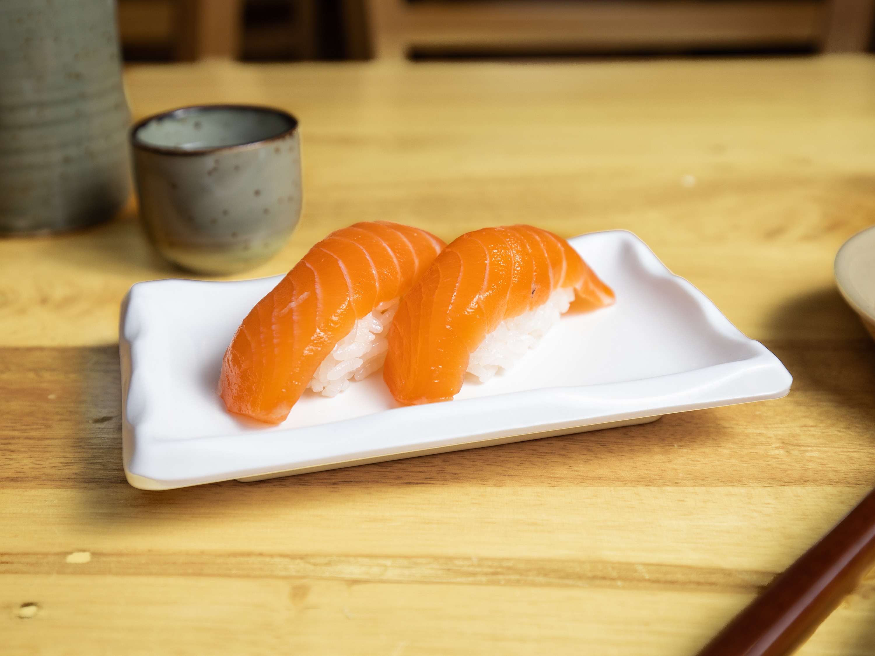 Order Salmon Nigiri food online from Izakayamayumi store, San Francisco on bringmethat.com