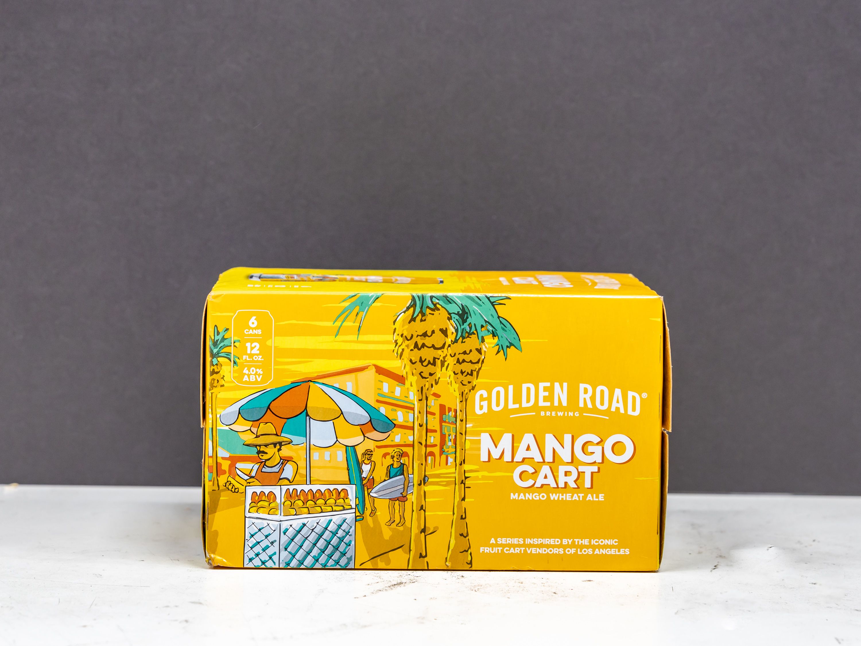 Order Golden Road Mango Cart, 6 Pack, 12 oz. Can Beer food online from Vic Liquors store, El Monte on bringmethat.com