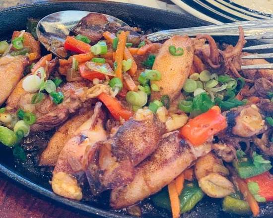 Order Sizzling Pusit food online from Tita Mia Filipino Restaurant & Cafe store, Niles on bringmethat.com