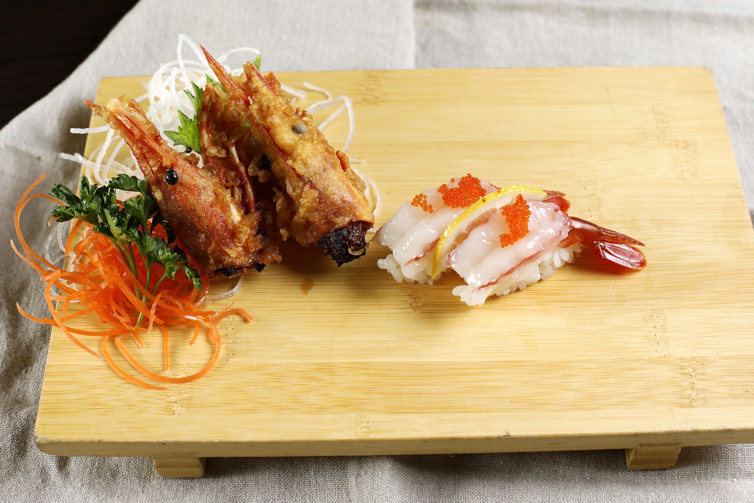 Order Ama-ebi (Sweet Shrimp) Nigiri food online from Tgi Sushi store, San Jose on bringmethat.com