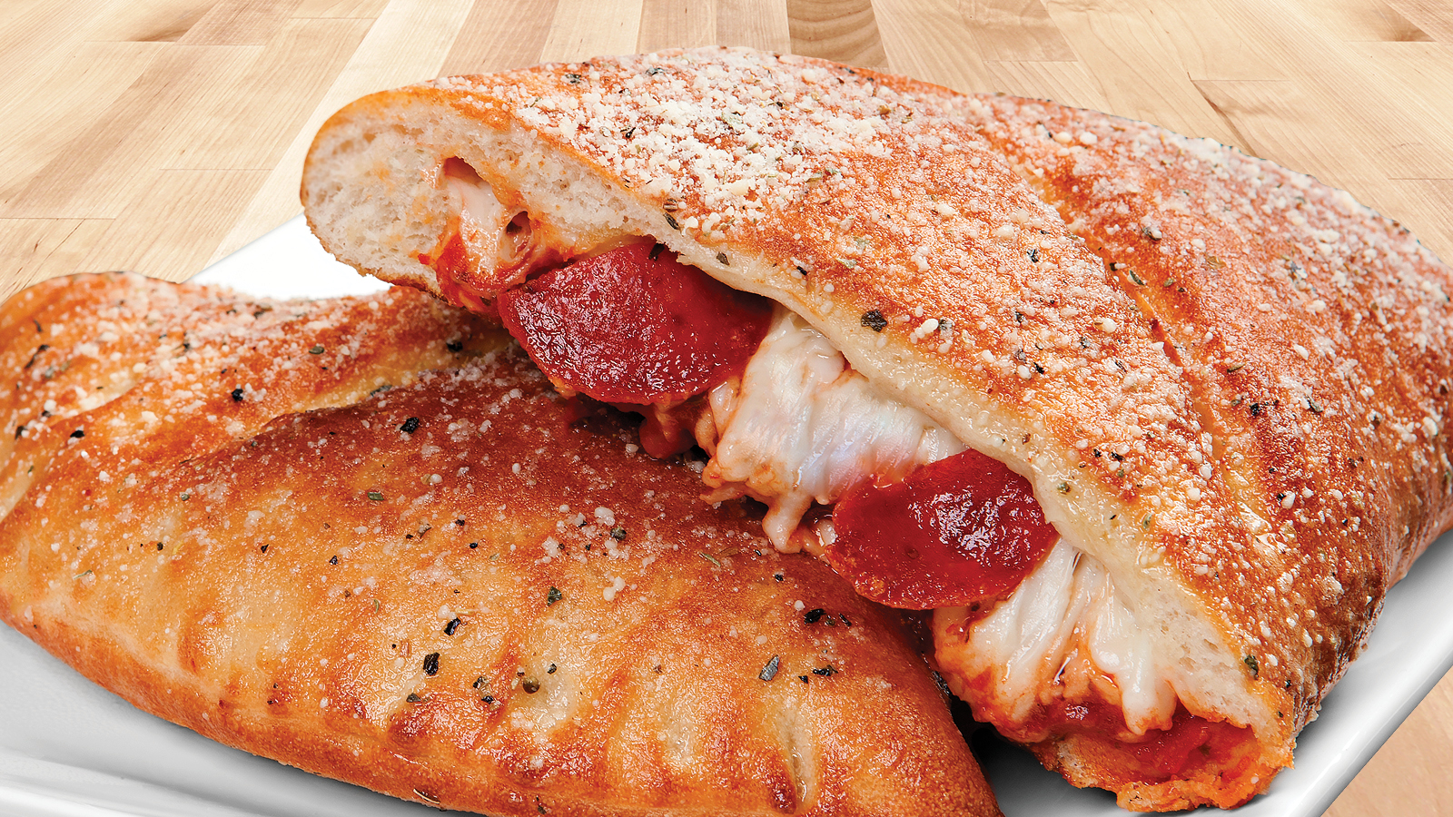 Order Pepperoni Calzone food online from Godfathers Pizza store, Cedar Rapids on bringmethat.com