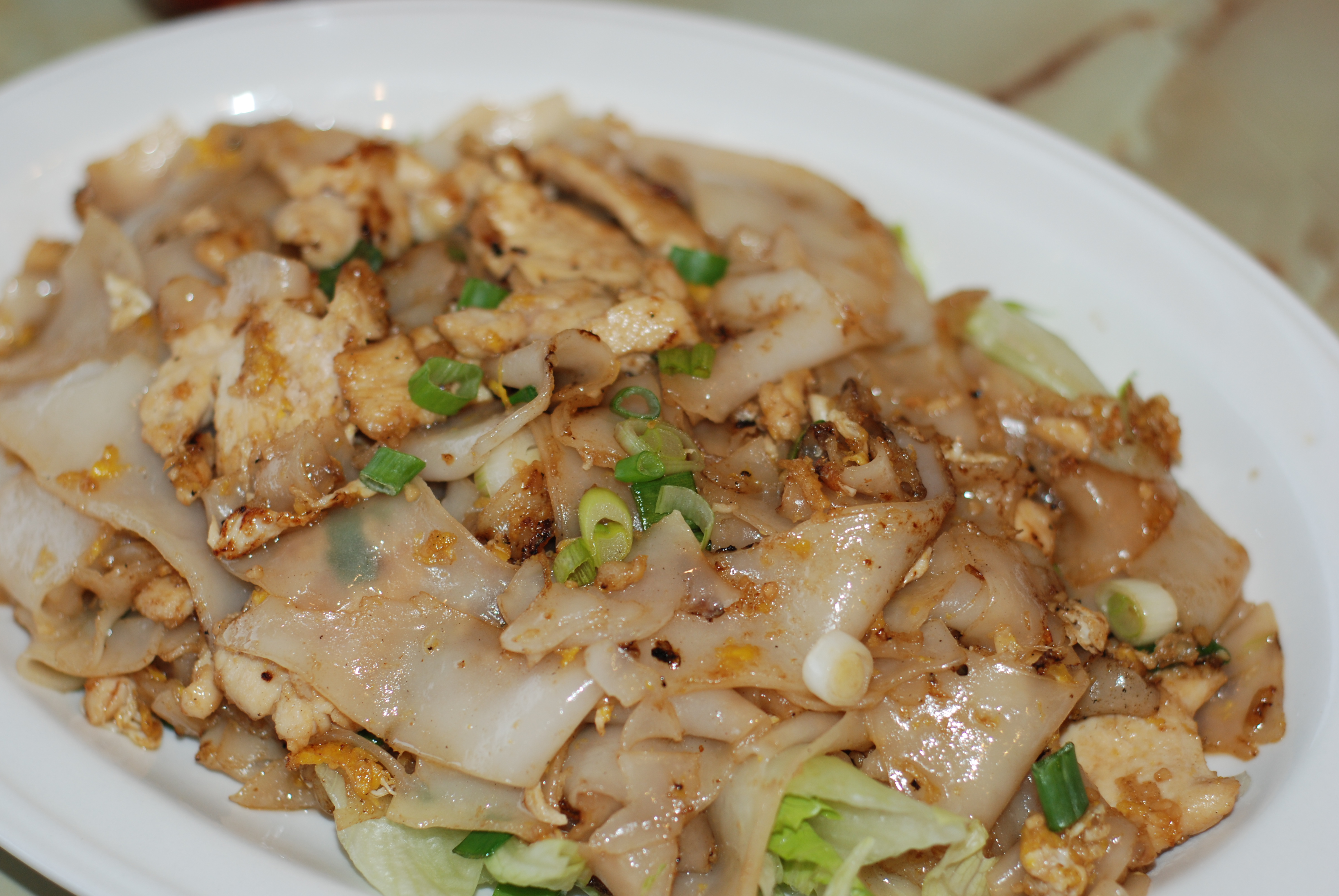 Order Gai Kua food online from Thai Fiesta Cafe store, Paramount on bringmethat.com