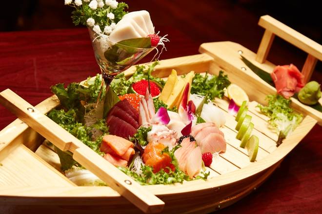 Order Sashimi Boat food online from Kyoto Japanese Steakhouse store, Royal Oak on bringmethat.com
