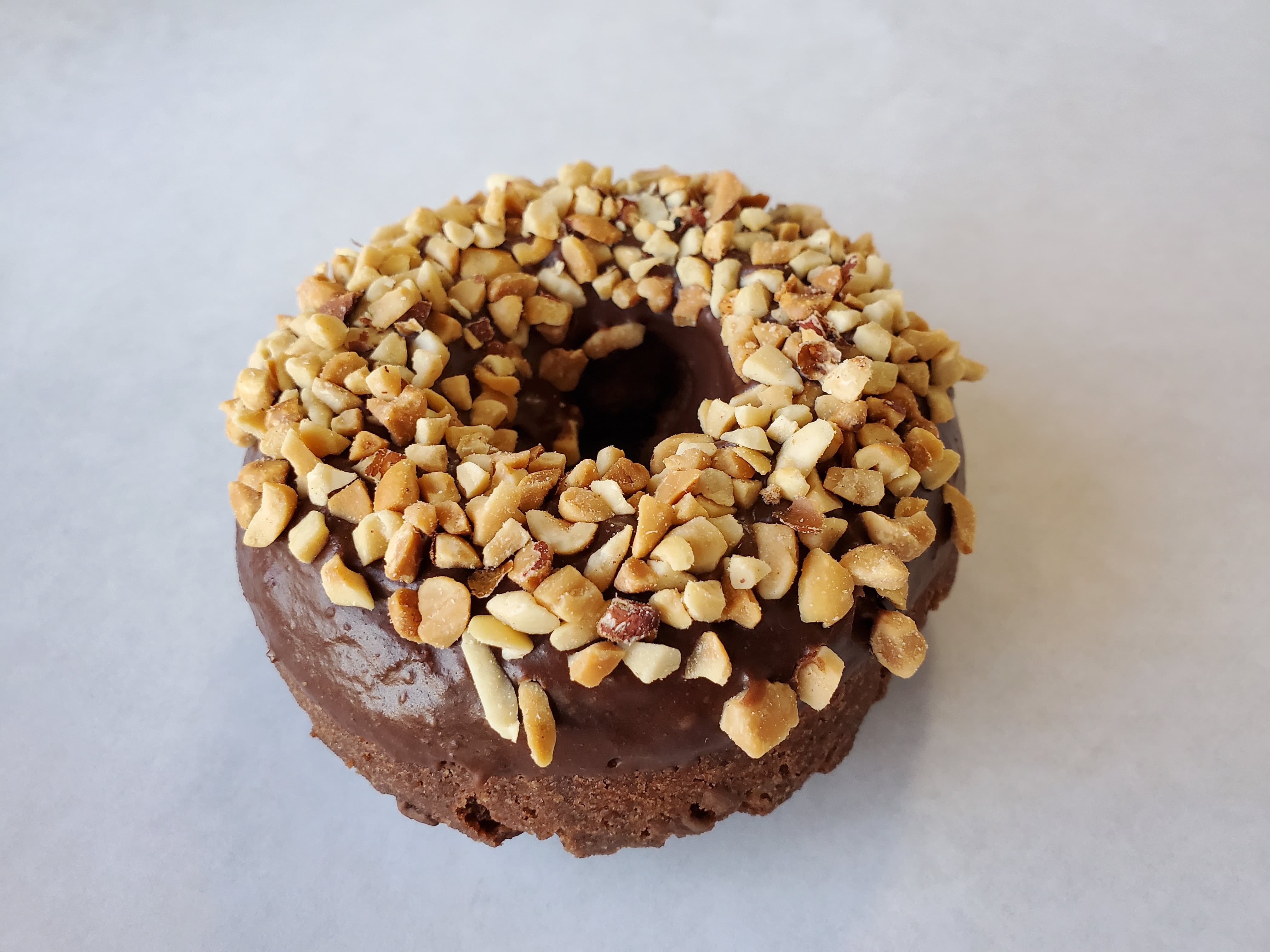Order Peanuts on devil's food cake food online from Honey Donuts store, Crowley on bringmethat.com