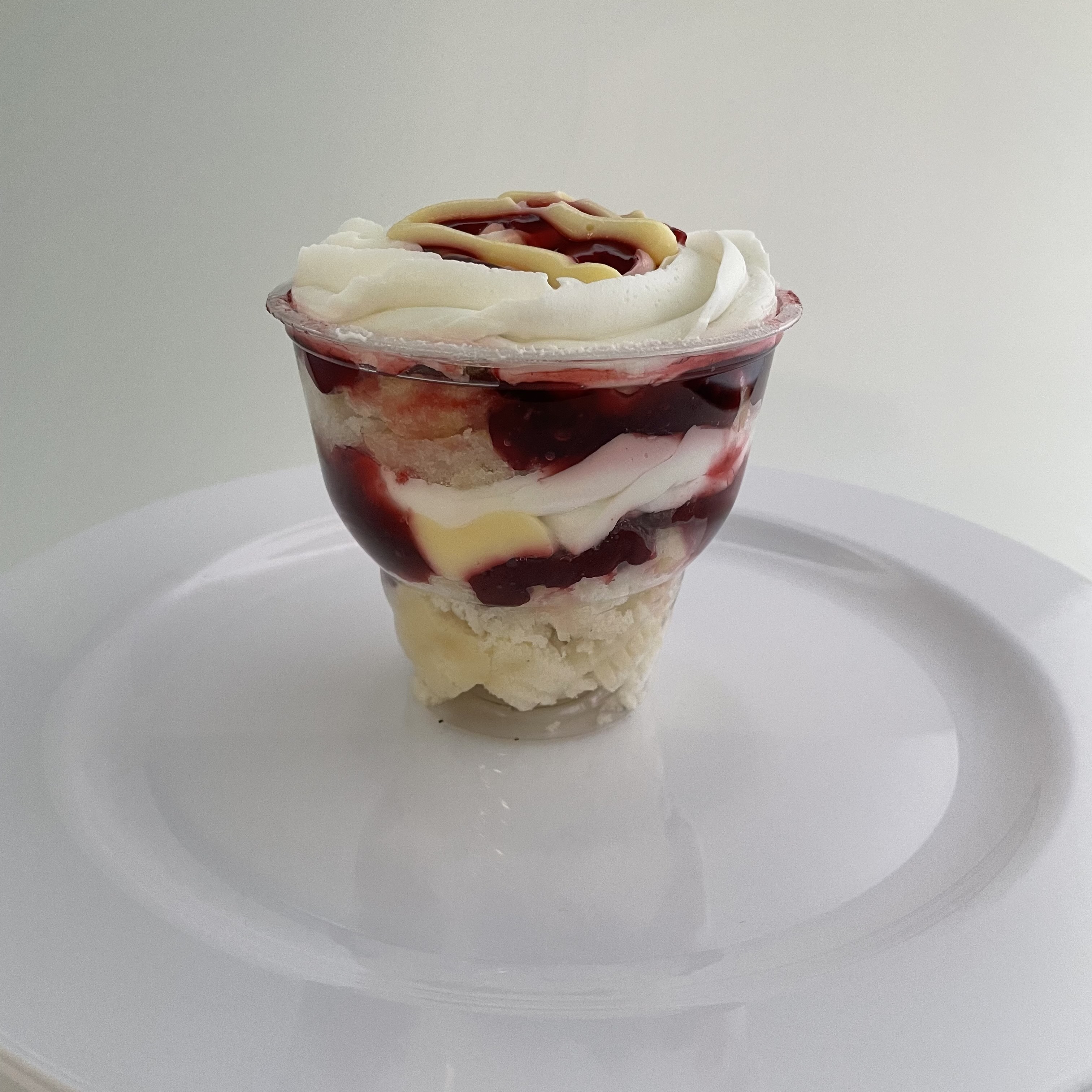Order Strawberry Cheesecake Parfait food online from The House of Cupcakes store, Princeton on bringmethat.com