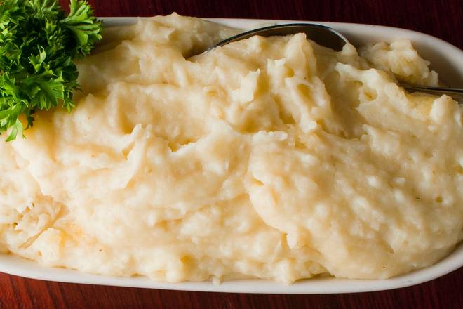 Order GARLIC MASHED POTATOES food online from Sullivan'S store, King Of Prussia on bringmethat.com