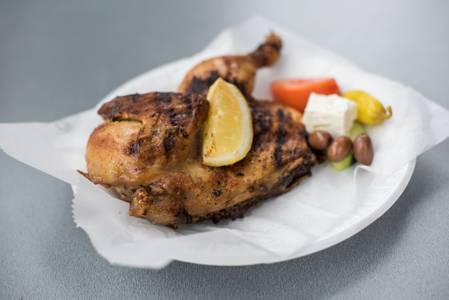 Order Athenian Roast Chicken Plate food online from Gyro Palace store, Milwaukee on bringmethat.com
