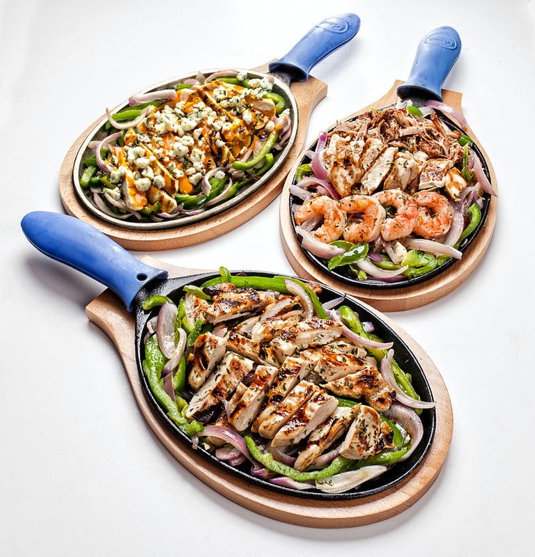 Order Sizzling Fajitas - Pick 1 food online from Arooga's Grille House and Sports Bar store, Warwick on bringmethat.com